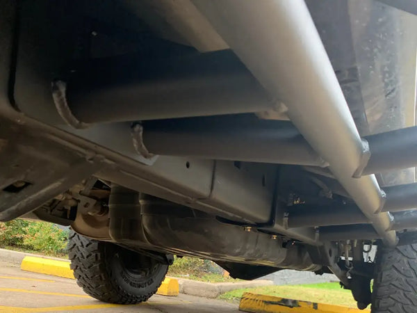Close up underside view of 4Runner with Trail Edition bolt on rock sliders - Cali Raised LED