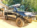 Front passenger side - Trail Edition Bolt On Rock Sliders on black 4Runner - Cali Raised LED